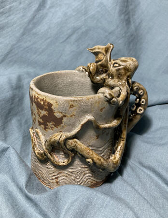 "Blue Spiral Cthulu" (2023), glazed stoneware mug