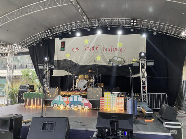 "Our Story Continues: The Ridleys Community Night" (2025), stage design